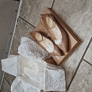 Christian Louboutin nude flats
